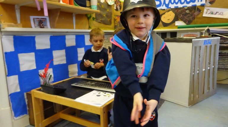 Child dressed as a police officer