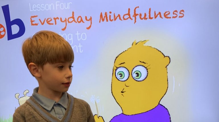 Child learning about mindfulness