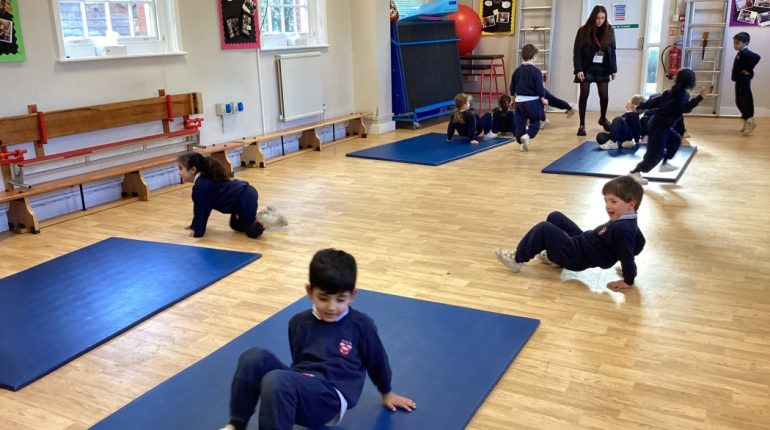 children walking backwards as they're crawling