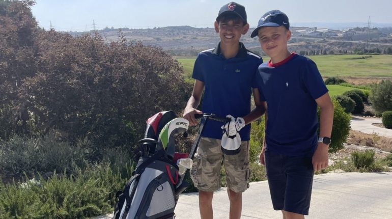 boys with golf equipment