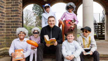 David Walliams with students dressed up
