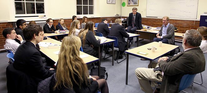 Sir Andrew Motion talking to pupils