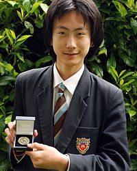 Simon Bai with his medal